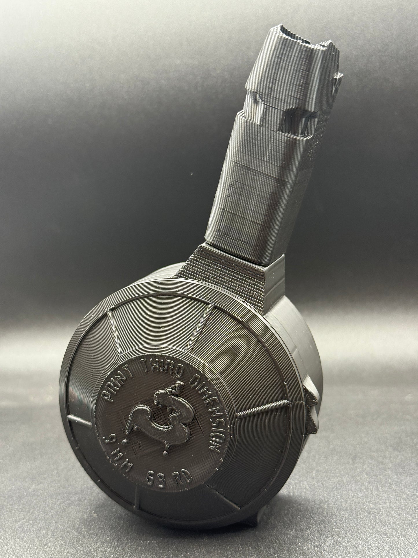LIGHTER SLEEVE/CONTAINER shaped like a glock magazine with a detachable drum mag