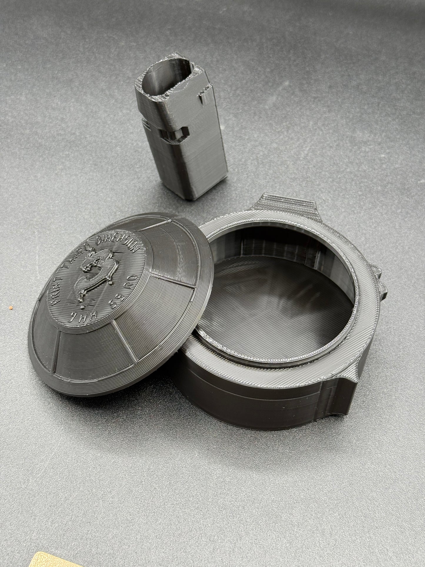 LIGHTER SLEEVE/CONTAINER shaped like a glock magazine with a detachable drum mag