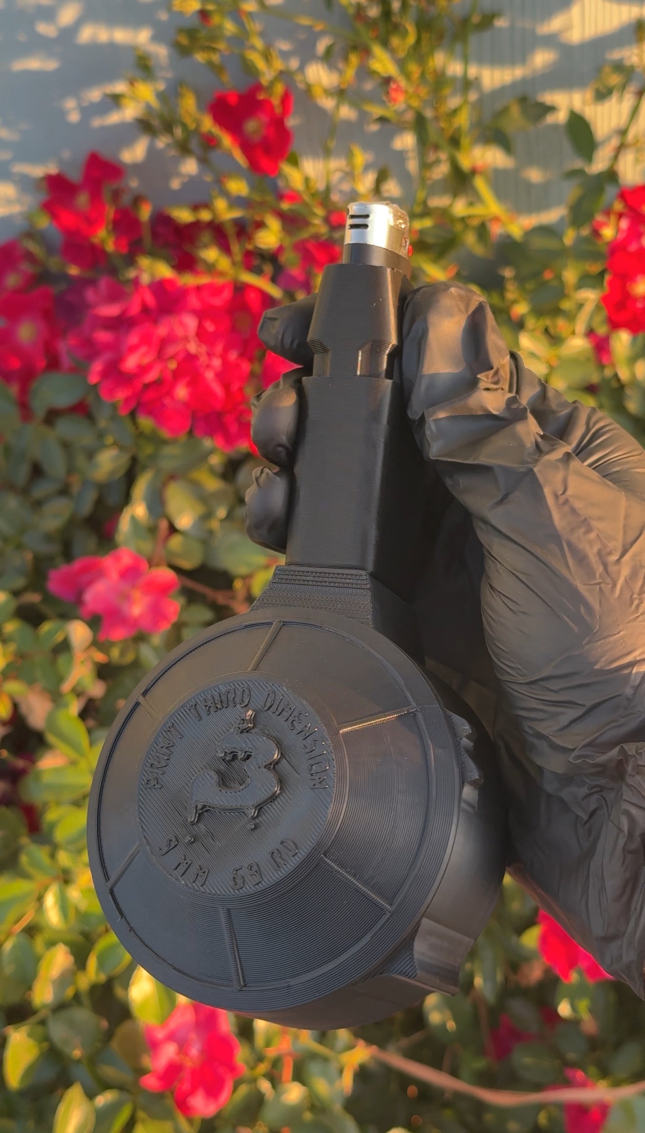 LIGHTER SLEEVE/CONTAINER shaped like a glock magazine with a detachable drum mag